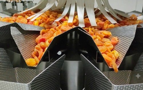 Calhas da pesadora multicabeças linear com produtos frescos